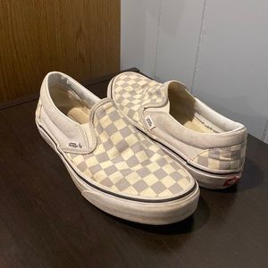 Gray checkered slip on vans